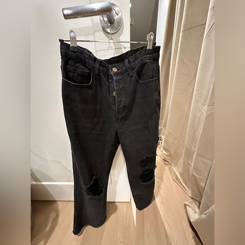 Distressed dark grey jeans